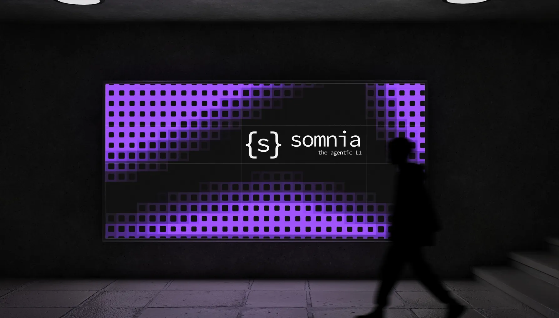 Somnia billboard in an underpass, the agentic L1, someone walking past