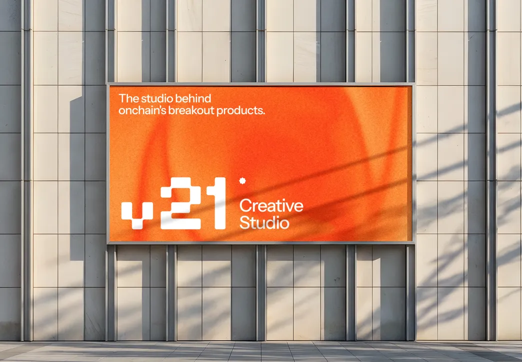 v21 Creative Studio billboard on a building’s front